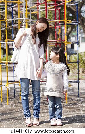 Stock Photo - Mother and Daughter at Playground. Fotosearch