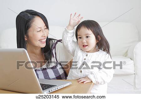 Mother and Daughter with Laptop View Large Photo Image Stock Photography - Mother and Daughter with Laptop. Fotosearch