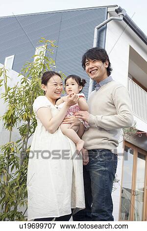 Mother and Father with Baby Girl View Large Photo Image Stock Photo - Mother and Father with Baby Girl. Fotosearch