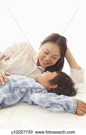 Mother and Son Looking at Each Other View Large Photo Image Stock Image - Mother and Son Looking at Each Other. Fotosearch