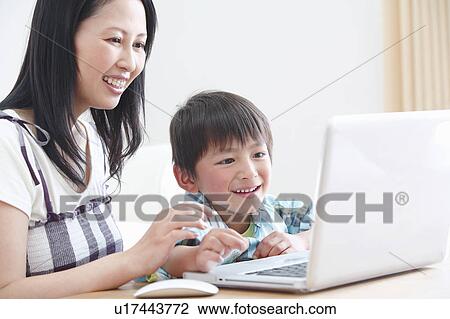 Mother and Son Using Laptop View Large Photo Image Stock Image - Mother and Son Using Laptop. Fotosearch