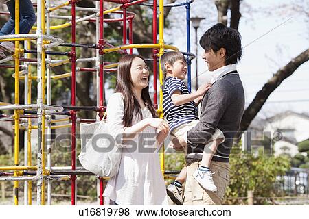 Mother, Father and Son at Playground View Large Photo Image Stock Photo - Mother, Father and Son at Playground. Fotosearch