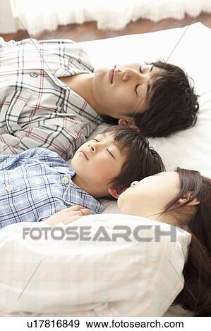 Mother, Father and Son Sleeping View Large Photo Image Stock Photo - Mother, Father and Son Sleeping. Fotosearch