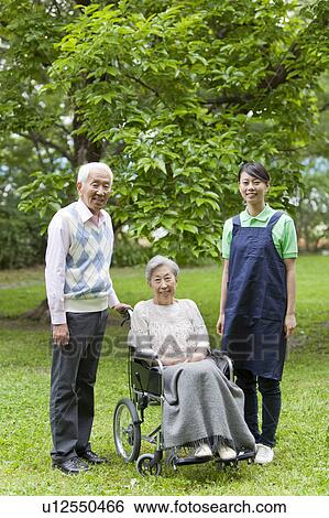 Nurse and Senior Couple in Park View Large Photo Image Stock Photograph - Nurse and Senior Couple in Park. Fotosearch