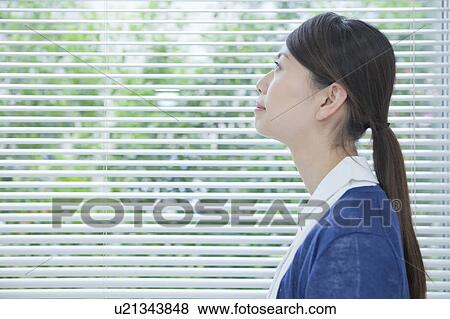 Nurse looking up, Kanagawa Prefecture, Honshu, Japan View Large Photo Image Stock Photo - Nurse looking up, Kanagawa Prefecture, Honshu, Japan. Fotosearch