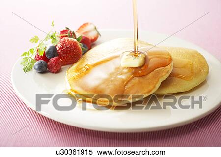 Pancakes with Syrup and Fruits View Large Photo Image Stock Photography - Pancakes with Syrup and Fruits. Fotosearch