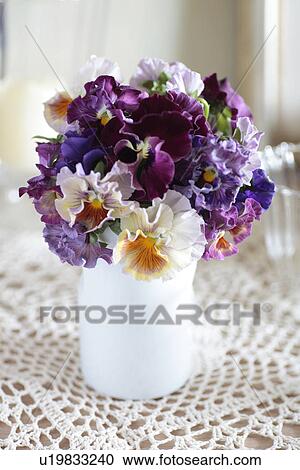 Stock Image - Pansies in a vase. Fotosearch