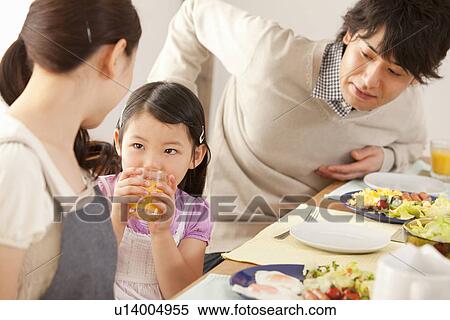 Parents and Daughter Having Breakfast View Large Photo Image Stock Photography - Parents and Daughter Having Breakfast. Fotosearch