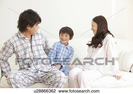 Parents and Young Son on Sofa View Large Photo Image Stock Image - Parents and Young Son on Sofa. Fotosearch