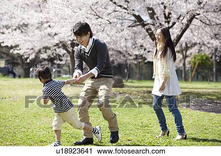 Parents Playing with Boy View Large Photo Image Stock Image - Parents Playing with Boy. Fotosearch