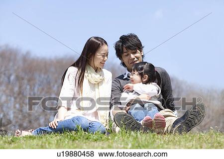 Parents with Baby Girl View Large Photo Image Stock Photo - Parents with Baby Girl. Fotosearch