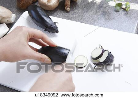 Person Chopping Aubergine View Large Photo Image Stock Image - Person Chopping Aubergine. Fotosearch