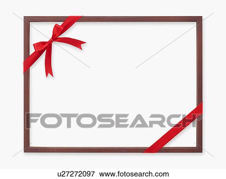Stock Photo - Picture frame wrapped in ribbon. Fotosearch