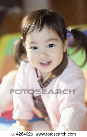 Stock Photography - Portrait of Baby Girl. Fotosearch