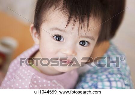 Portrait of Baby in Mother's Arms View Large Photo Image Stock Photo - Portrait of Baby in Mother's Arms. Fotosearch