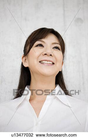 Portrait of Mid Adult Woman View Large Photo Image Stock Image - Portrait of Mid Adult Woman. Fotosearch
