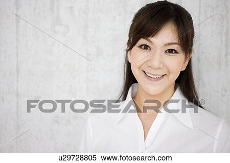 Stock Photography - Portrait of Mid Adult Woman. Fotosearch