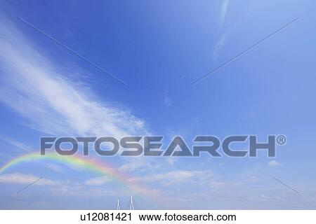Stock Image - Rainbow over Tsurumi Tsubasa Bridge. Fotosearch