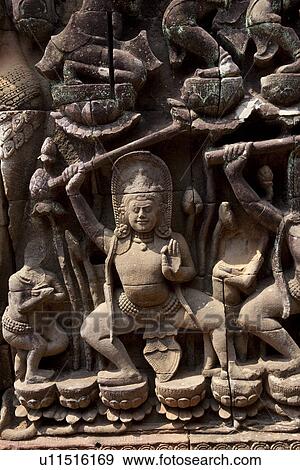 Stock Photo - Relief at Angkor Thom. Fotosearch