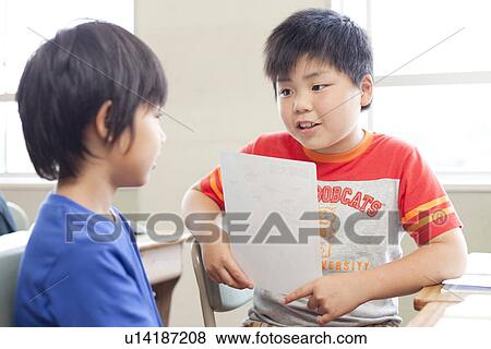 Schooboys Talking in Classroom View Large Photo Image Stock Photo - Schooboys Talking in Classroom. Fotosearch