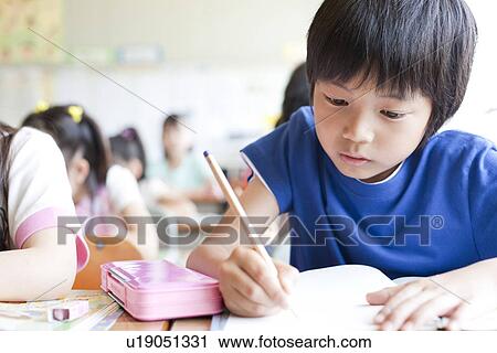 Schoolboy Studying View Large Photo Image Stock Image - Schoolboy Studying. Fotosearch