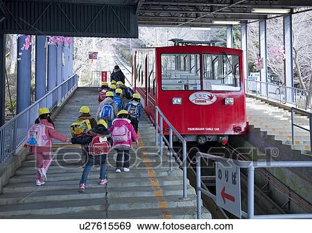 Stock Photo - Schoolchildren Boarding Cable Car. Fotosearch