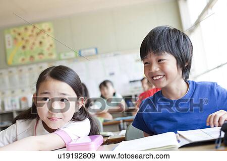 Stock Photo - Schoolchildren in Classroom. Fotosearch