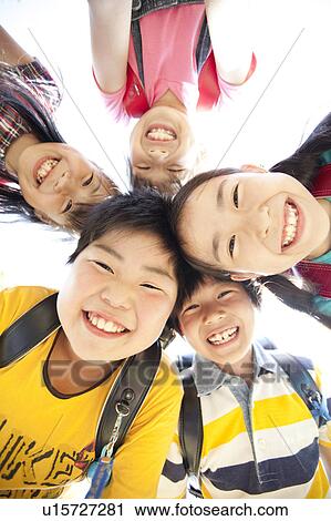 Schoolchildren in Huddle View Large Photo Image Stock Image - Schoolchildren in Huddle. Fotosearch