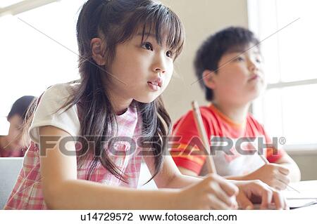 Stock Image - Schoolchildren Listening. Fotosearch