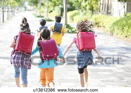 Stock Photograph - Schoolchildren Running. Fotosearch