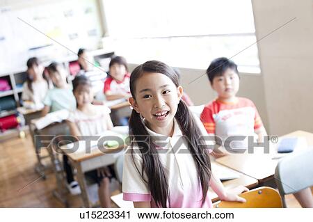 Schoolgirl Answering in Classroom View Large Photo Image Stock Image - Schoolgirl Answering in Classroom. Fotosearch
