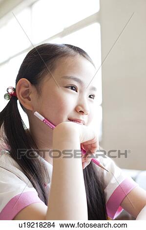 Schoolgirl in Classroom View Large Photo Image Picture - Schoolgirl in Classroom. Fotosearch