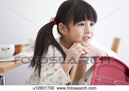 Stock Image - Schoolgirl in Morning. Fotosearch