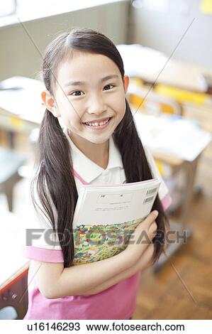 Schoolgirl with Textbooks View Large Photo Image Stock Image - Schoolgirl with Textbooks. Fotosearch