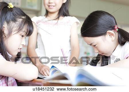 Schoolgirls Studying View Large Photo Image Stock Image - Schoolgirls Studying. Fotosearch
