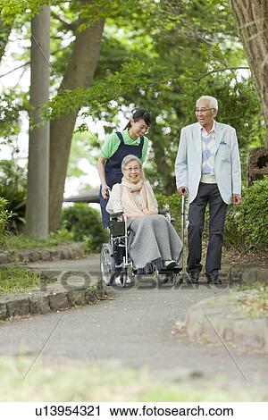 Senior Couple and Nurse in Park View Large Photo Image Stock Image - Senior Couple and Nurse in Park. Fotosearch