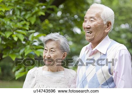 Senior couple looking away, Tokyo Prefecture, Honshu, Japan View Large Photo Image Stock Photograph - Senior couple looking away, Tokyo Prefecture, Honshu, Japan. Fotosearch