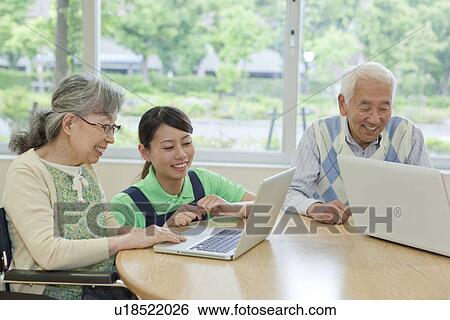 Senior people using laptop, Kanagawa Prefecture, Honshu, Japan View Large Photo Image Stock Photograph - Senior people using laptop, Kanagawa Prefecture, Honshu, Japan. Fotosearch