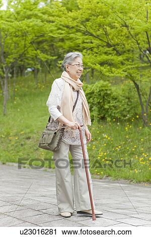 Stock Image - Senior Woman Walking. Fotosearch