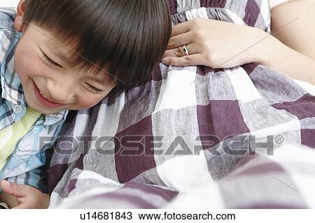 Son Listening Mother's Stomach View Large Photo Image Stock Image - Son Listening Mother's Stomach. Fotosearch