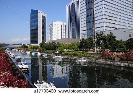 Stock Image - Speedboats in Canal. Fotosearch