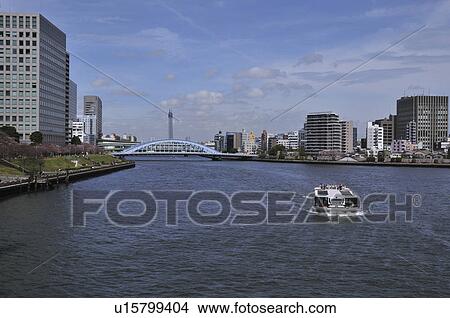 Tourboat at Sumida River, Eita Bridge in Background View Large Photo Image Picture - Tourboat at Sumida River, Eita Bridge in Background. Fotosearch