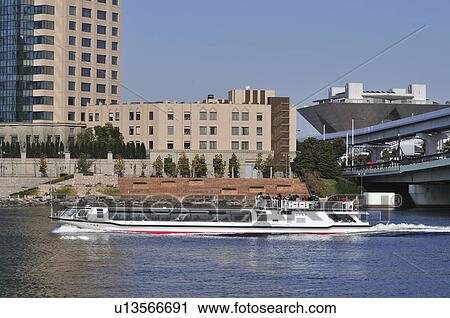 Stock Image - Tourboat at Sumida River. Fotosearch