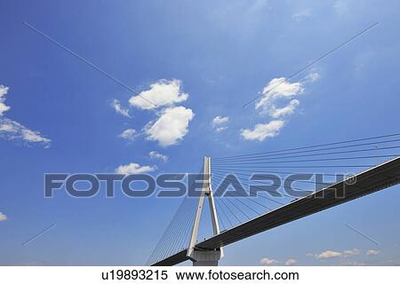 Stock Photography - Tsurumi Tsubasa Bridge Against Blue Sky. Fotosearch
