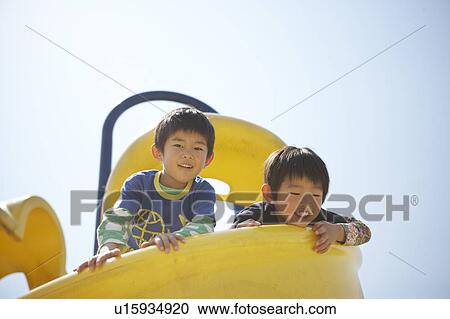 Two Children Against Blue Sky View Large Photo Image Stock Image - Two Children Against Blue Sky. Fotosearch