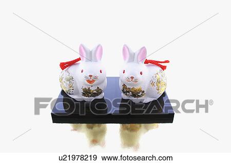 Stock Photo - Two Rabbit Ornaments. Fotosearch