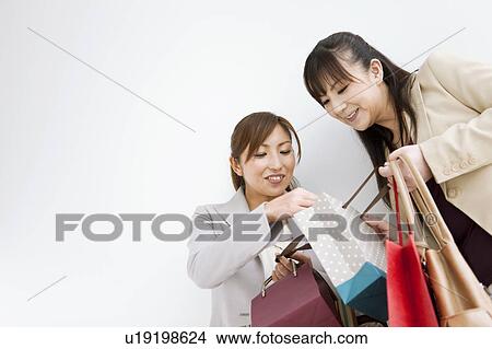 Two Women With Shopping View Large Photo Image Picture - Two Women With Shopping. Fotosearch