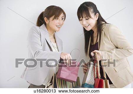 Two Women With Shopping View Large Photo Image Stock Image - Two Women With Shopping. Fotosearch