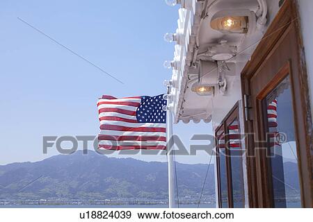 Stock Photo - US Flag in Boat. Fotosearch