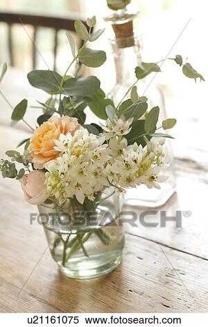 Vase of Flowers on Wooden Table View Large Photo Image Stock Photography - Vase of Flowers on Wooden Table. Fotosearch